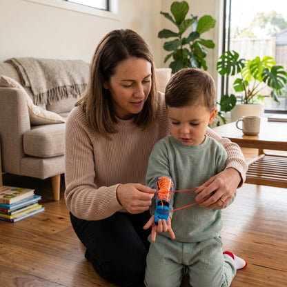 Kids Wrist Mounted String Launcher Toy